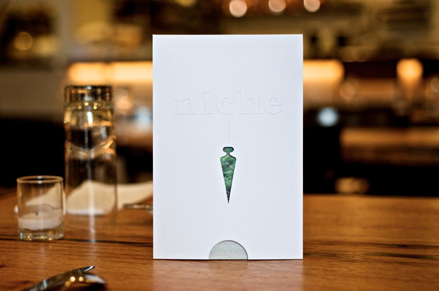 Niche Restaurant menu standing on a table