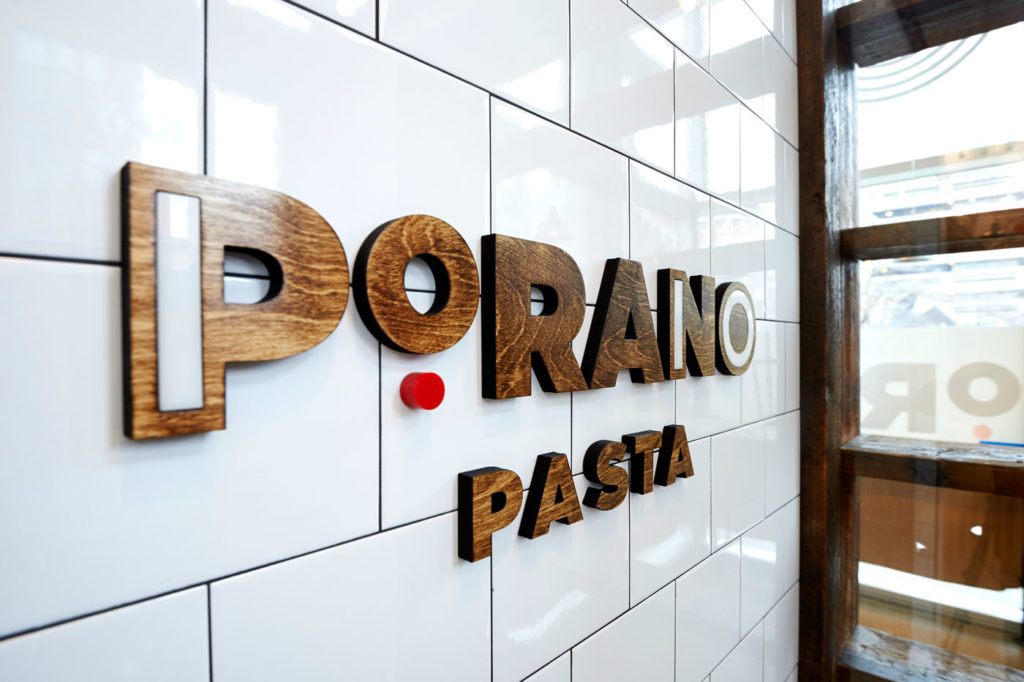 Porano Pasta Restaurant Branding - Logo Wall