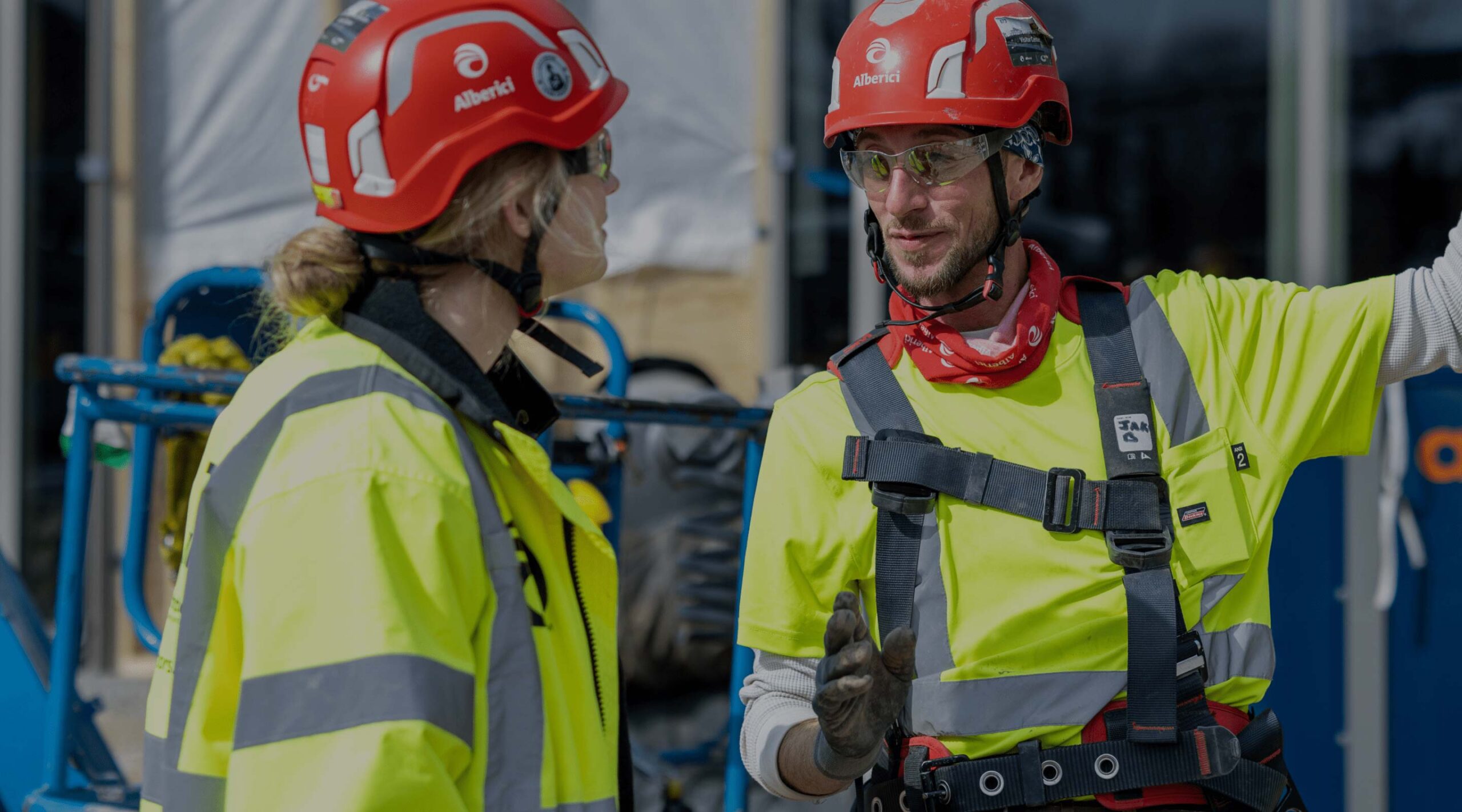 Phot of commercial construction teams wearing Alberici branded hard hats