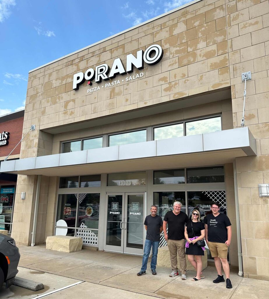 Atomicdust team members at Porano Pasta on opening day