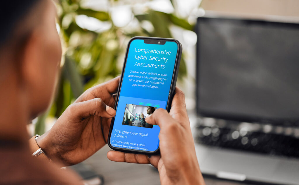 A visitor views the Secure Data Technologies website on a mobile device